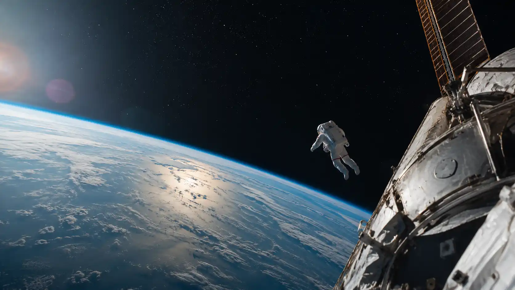 Astronauta flotando en el espacio exterior junto a la estación espacial con la Tierra de fondo